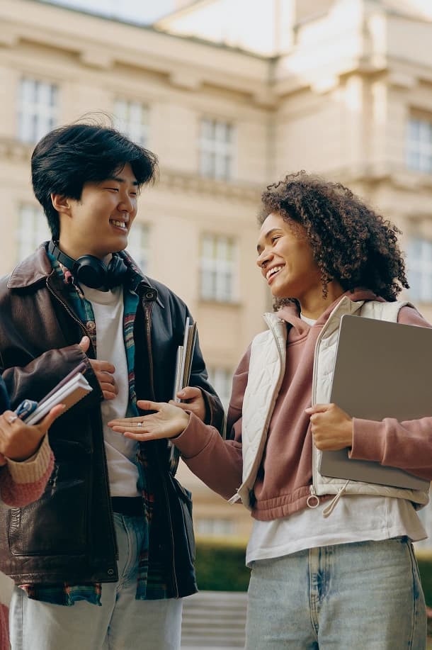 Students talking near college building